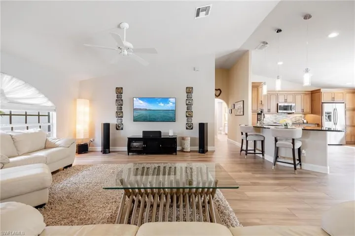 Open Living room with high vaulted ceiling