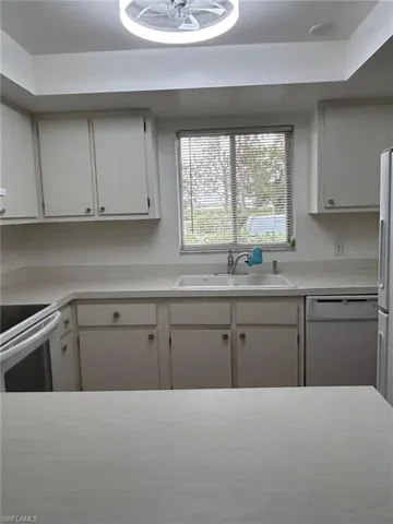 KITCHEN AREA VIEW FROM DINING ROOM