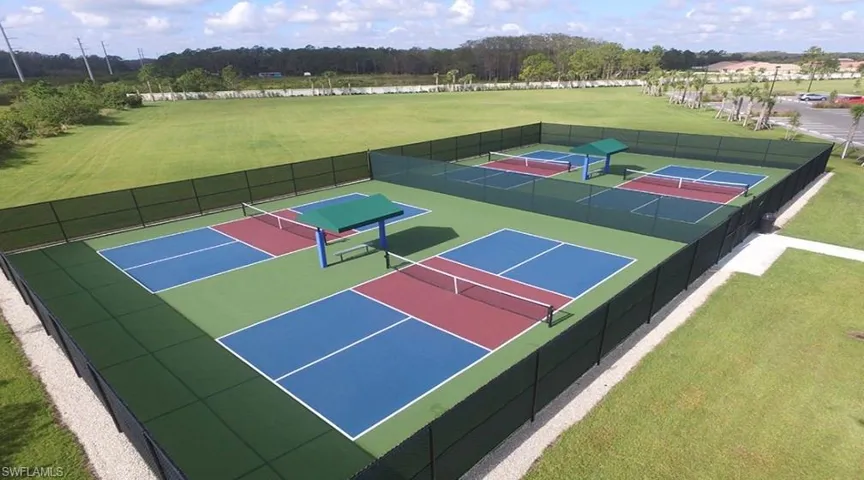 View of basketball court with a tennis court