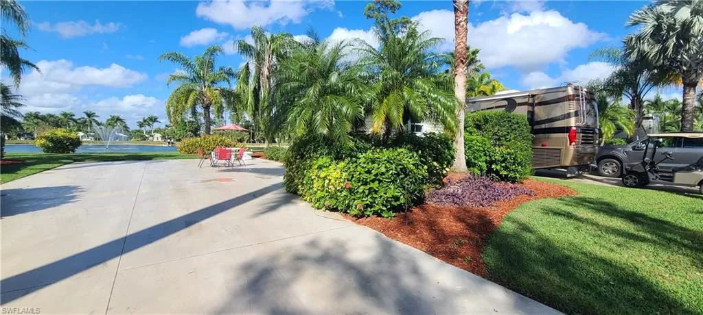 View of home's community featuring a yard