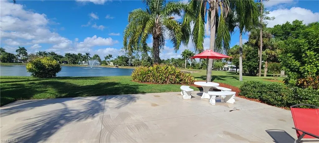 View of patio with a water view
