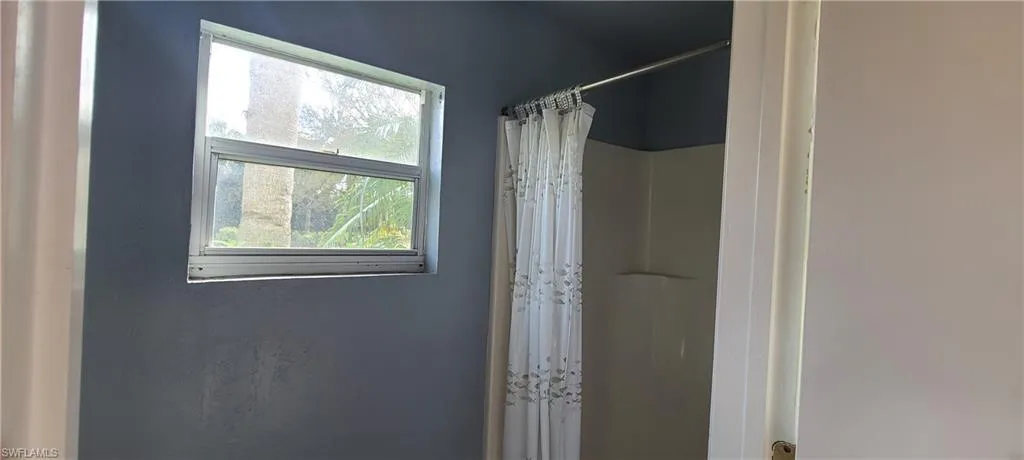 Bathroom featuring walk in shower