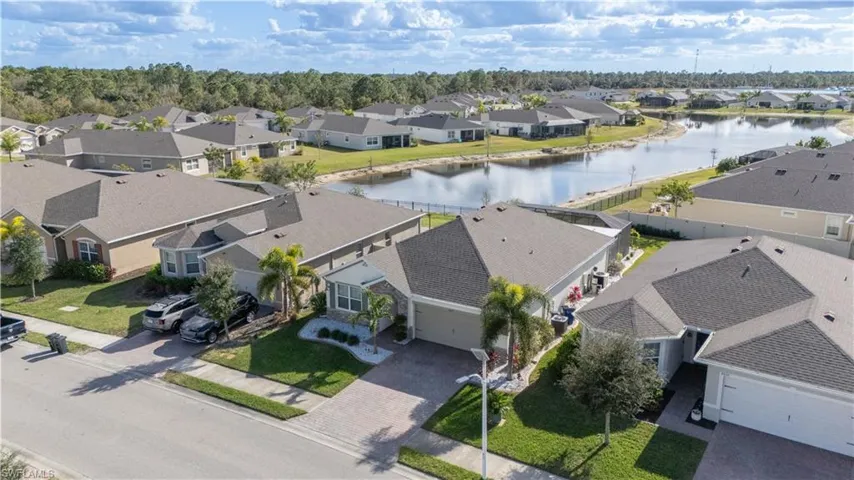 Aerial view of residential area with a large body of water