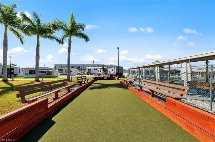 Surrounding community featuring a game area