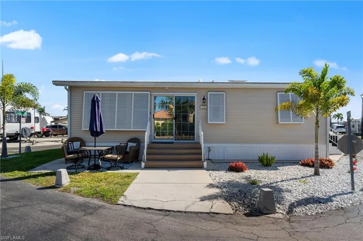 Manufactured / mobile home featuring entry steps and a patio area