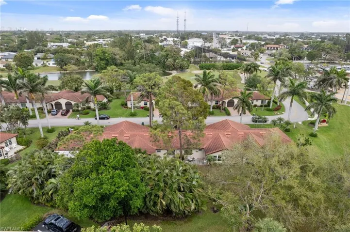 Aerial view of residential area with a large body of water