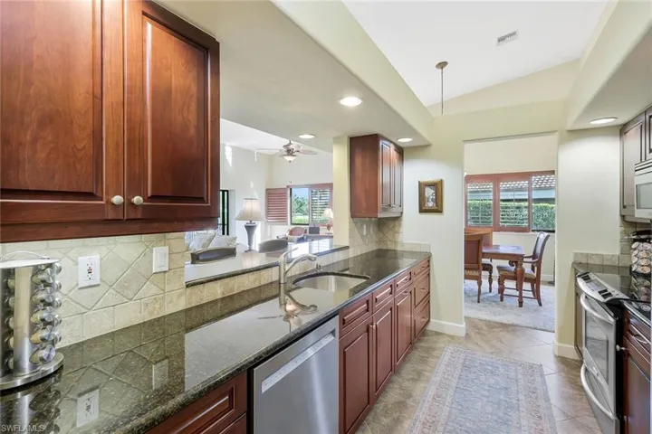 Black Granite, Custom Wood Cabinetry