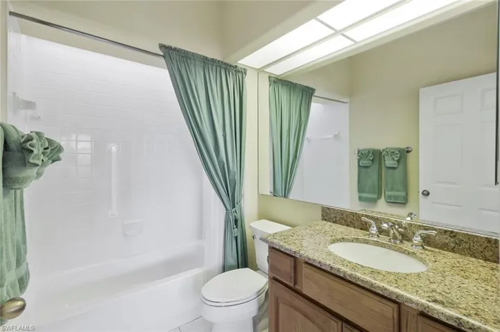 Guest Bath #2 with Tub Shower Combo, Skylight, Raised Cabinetry