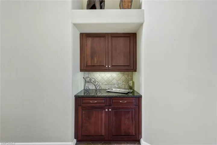 Bar Area In Great Room, Granite/Solid Wood Cabinetry