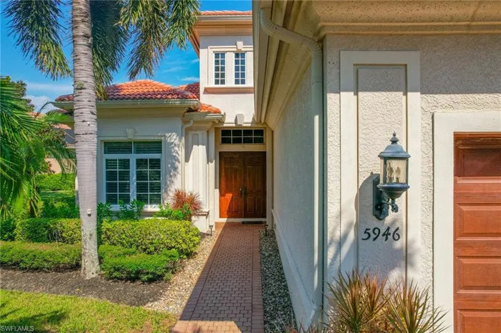 Property entrance with a garage