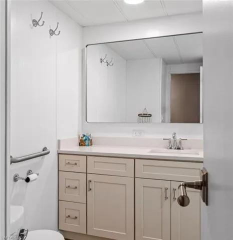 Bathroom featuring vanity and toilet