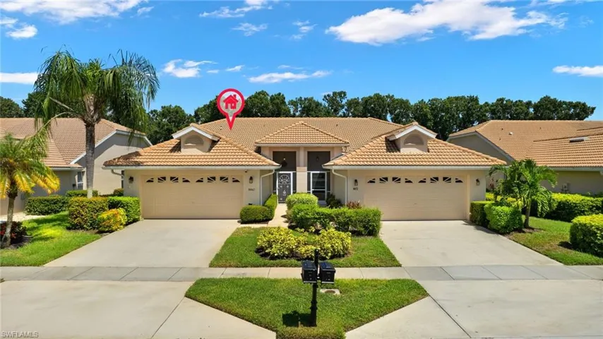 View of front of home featuring a garage