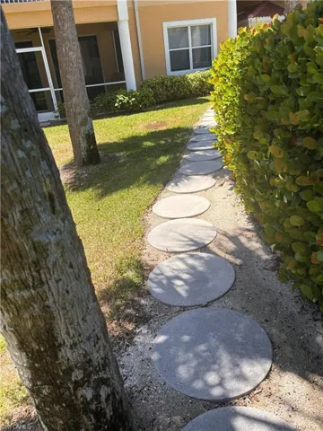 Circular stepping stones define a landscaped pathway
