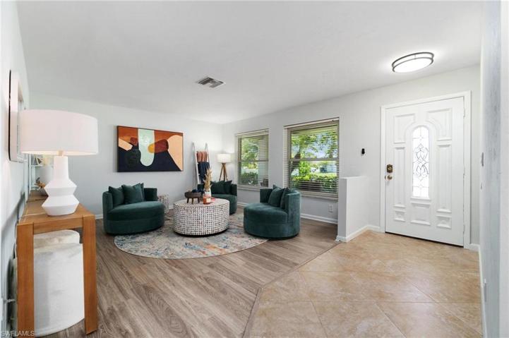 Spacious den/bonus room is open to the foyer entry and freshly painted interior for a move in ready feel.