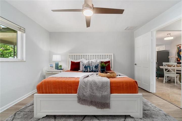Bright Primary Bedroom en-suite is situated off rear with sparkling pool views.