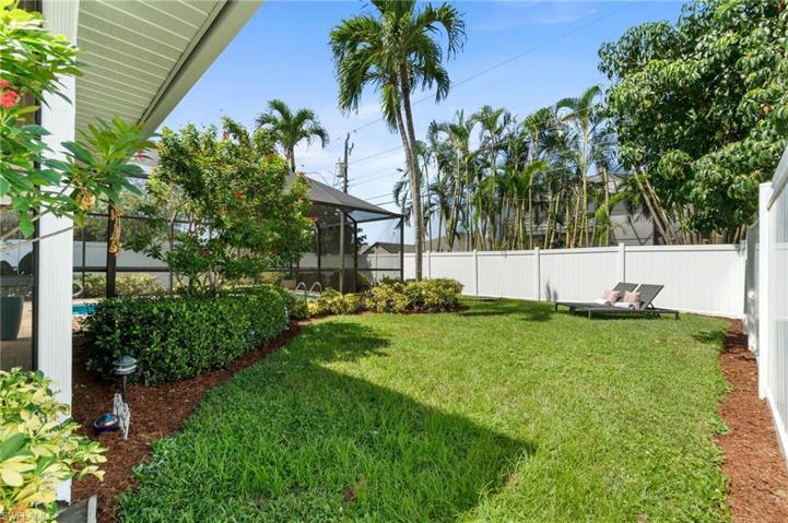 Rare bonus yard space surrounds the structure on 3 sides with updated meticulous landscaping.