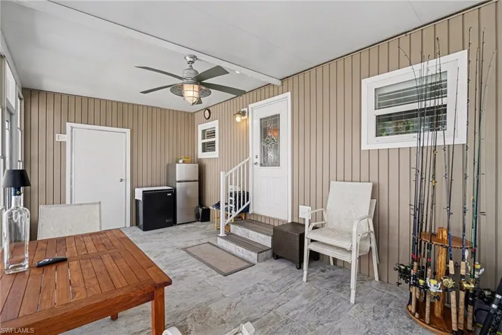 View of patio featuring ceiling fan and outdoor dining area