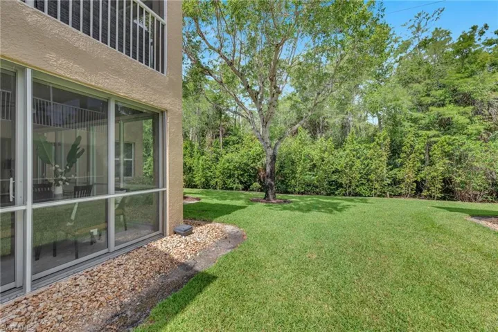 Private lawn behind home