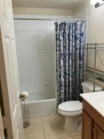 The centrally located guest bath is clean and bright.  There is also a half bath on the main floor