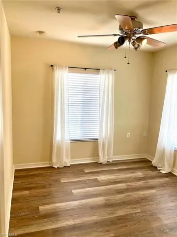 Guest Room 1 features lots of window, plenty of storage and an overhead fan