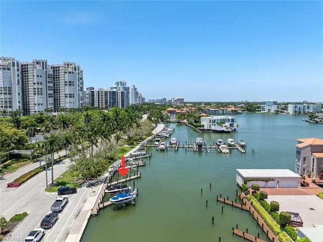 Property view of water featuring a dock