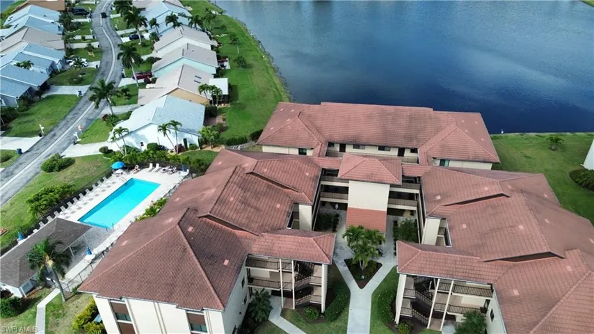 Aerial view of residential area with a nearby body of water