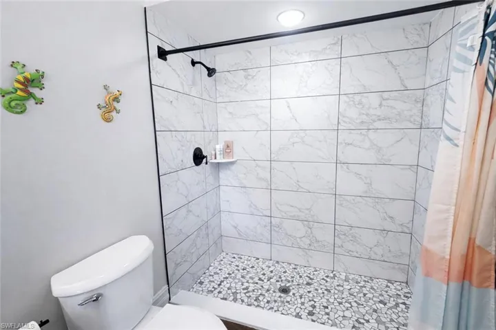 Bathroom featuring a stall shower