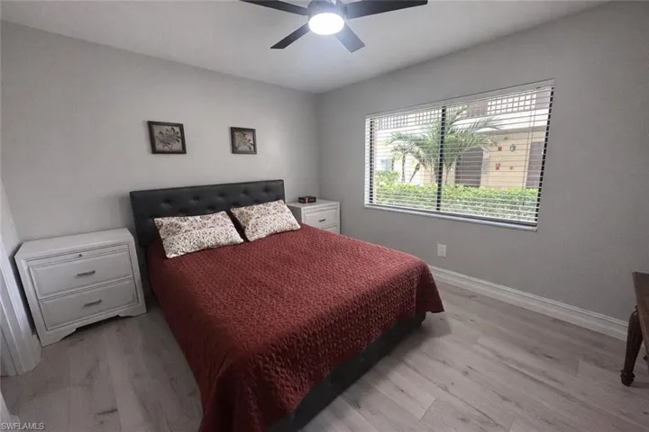 Bedroom featuring light wood-style floors and ceiling fan