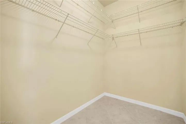 Separate double closets in primary bedroom