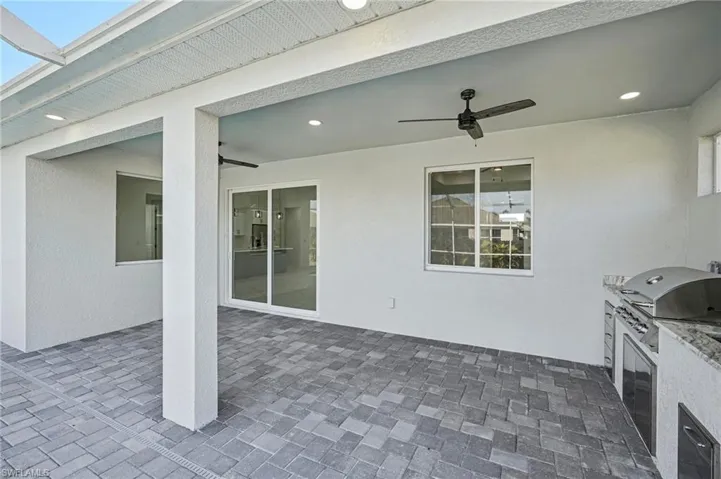 View of patio featuring grilling area and an outdoor kitchen