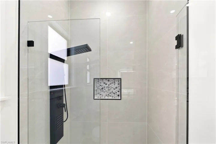 Full bath featuring a stall shower