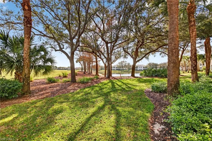 View of grassy yard featuring a water view