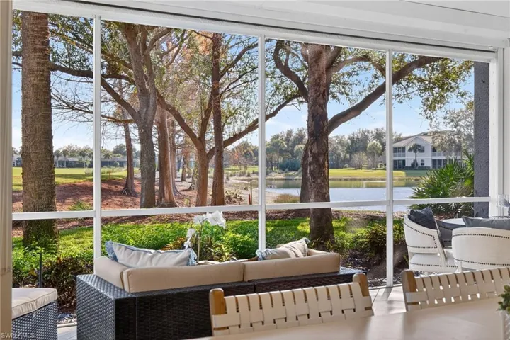 Sunroom / solarium with outdoor seating and a water view