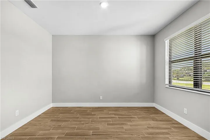 Empty room with wood finish floors