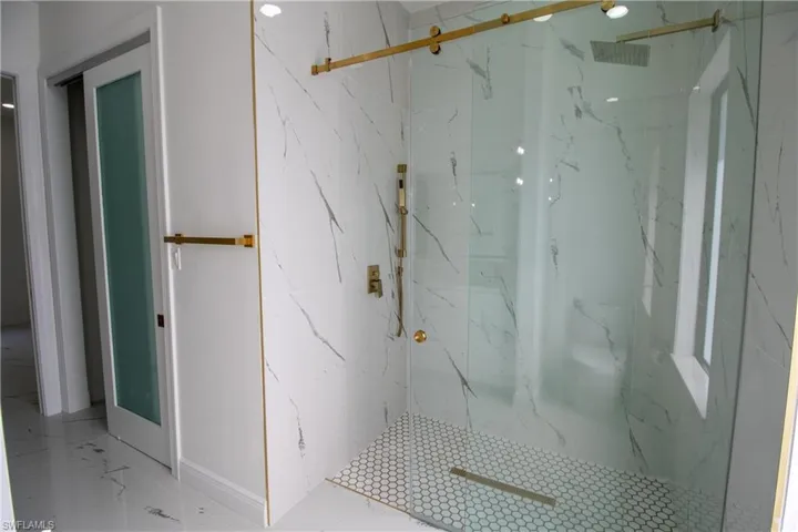 Bathroom with tiled shower