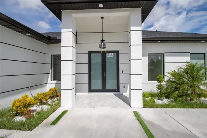 Property entrance with french doors