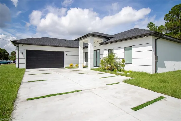 Prairie-style home featuring a garage