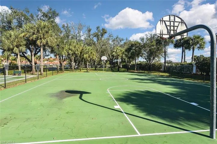 View of sport court with community basketball court and fence