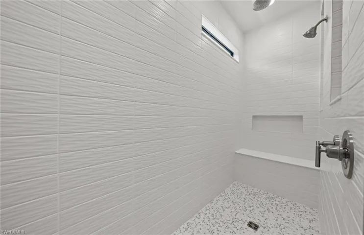 Enlarged shower in owner's suite