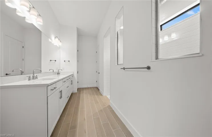 Enlarged shower & huge owner's suite closet