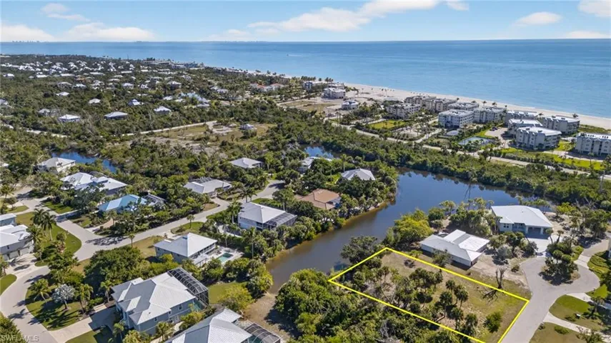 Aerial view of waterfront lot and proximity to the beach