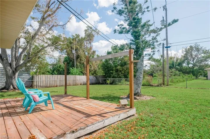 Deck overlooking fenced in area