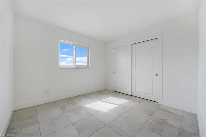 Unfurnished bedroom featuring a closet