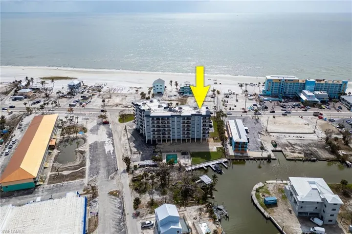 Bird's eye view with a beach view and a water view