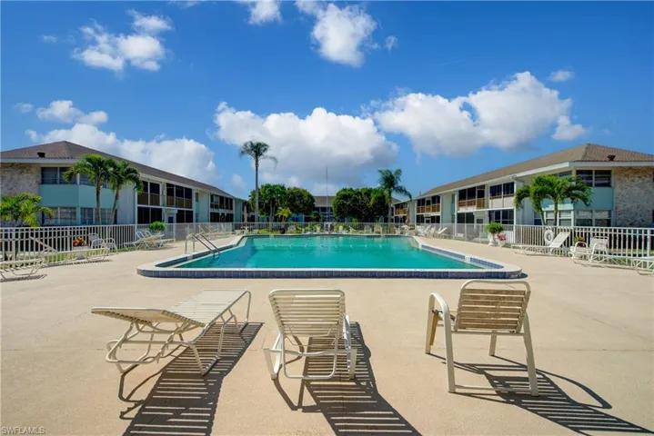 Beautiful community pool with a patio area