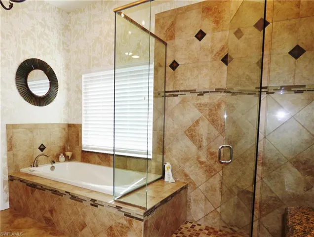 Upgraded seamless shower and tub.