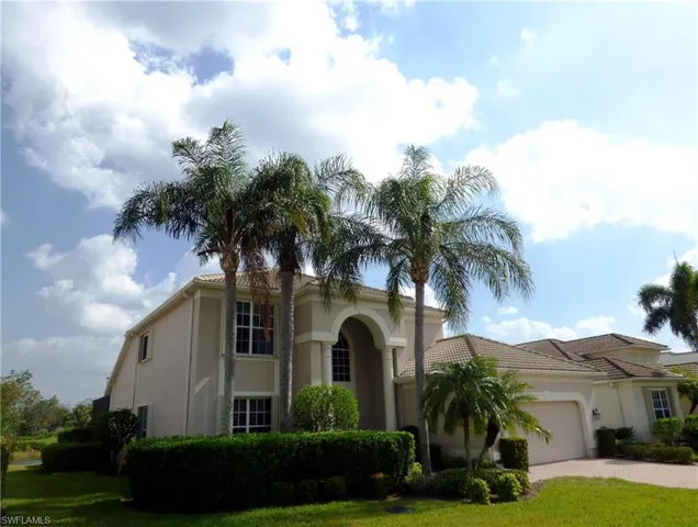 Front of home with extra space along the side of the home.