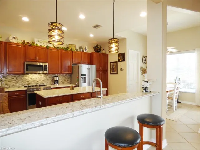 Kitchen featuring a breakfast bar area.