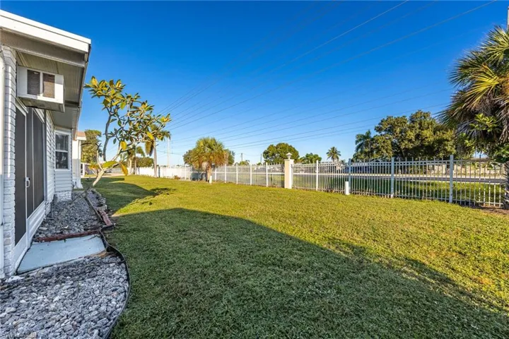 View of fenced backyard