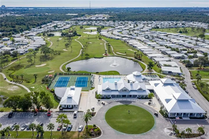 Bird's eye view of a nearby body of water and a golf club